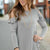 Ruffle Accented Cold Shoulder Tee